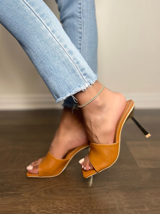 Kourtney Heel-Tan